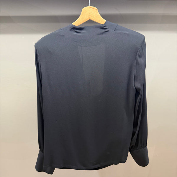 BLUSA CON SCOLLO PROFONDO DRAPPEGGIATO